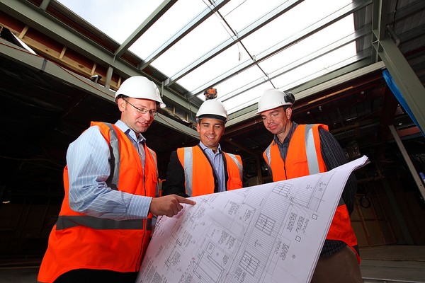 Bayfair Shopping Centre manager Andrew Wadsworth, Tauranga MP Simon Bridges and Rob Bailey from Marra Construction survey plans